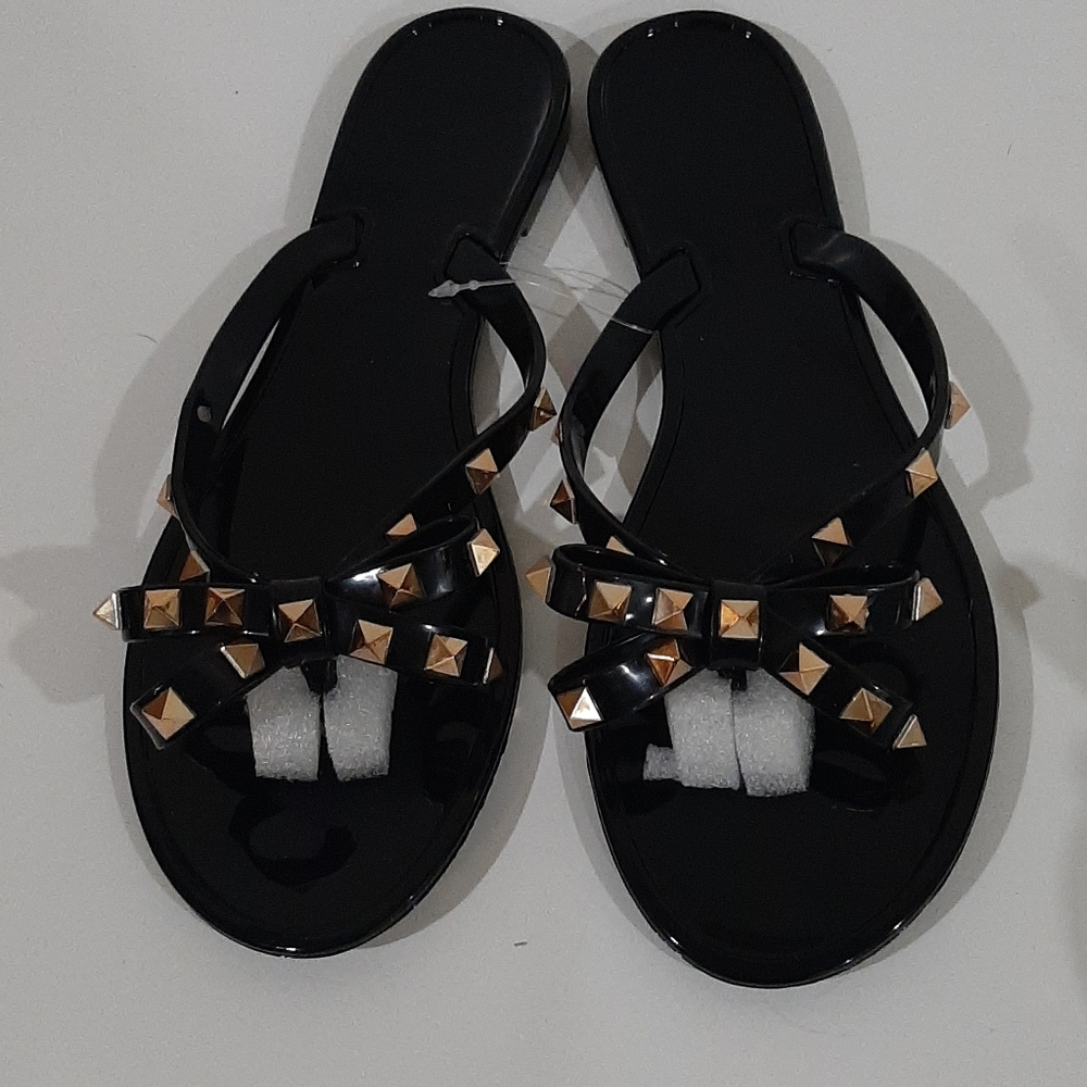 Cute plastic flip flops.